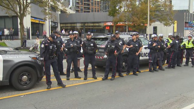 One arrested as cycling advocates block crew removing bike lanes