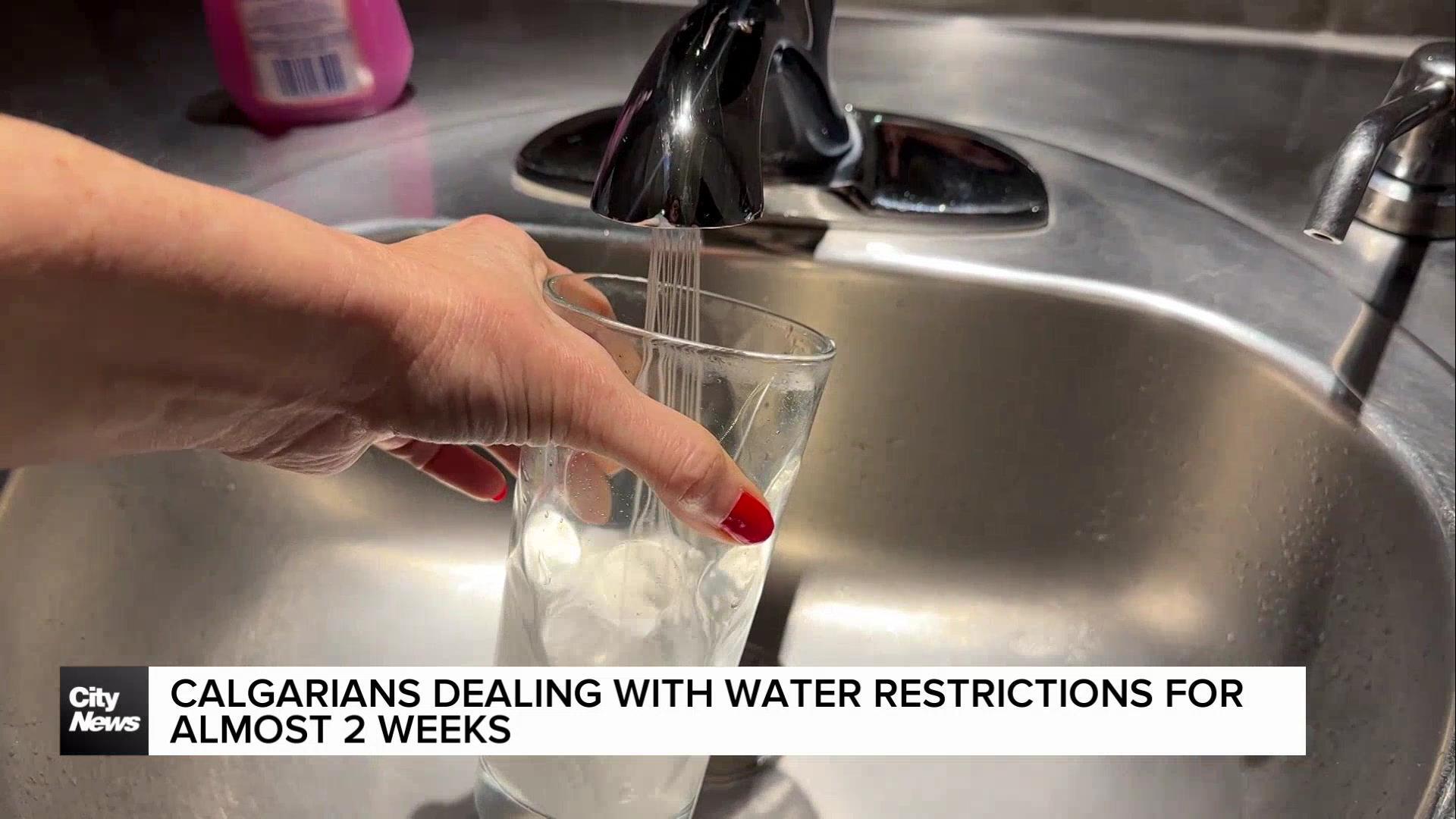 Calgarians dealing with water restrictions for almost two weeks