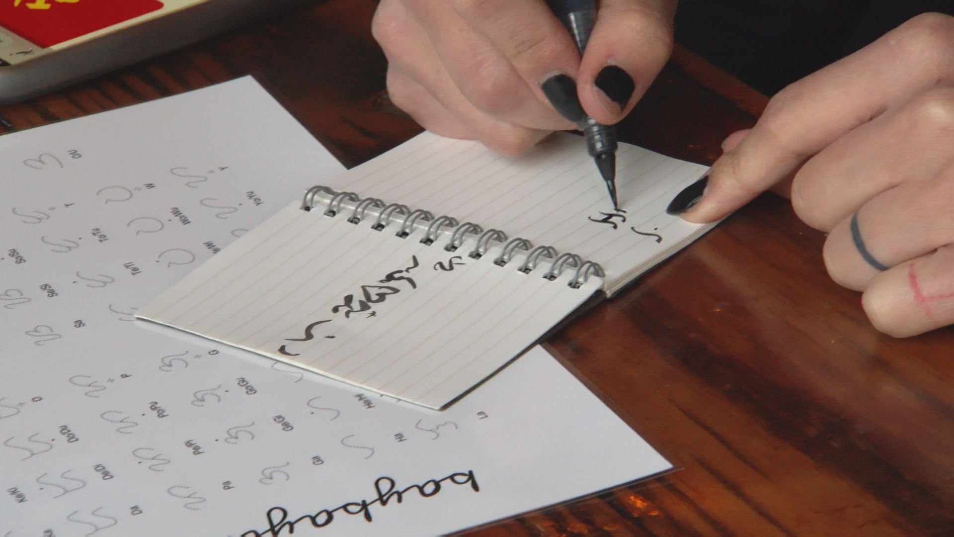 Second-generation Filipinos in Canada learning Baybayin at 'Harana Night'