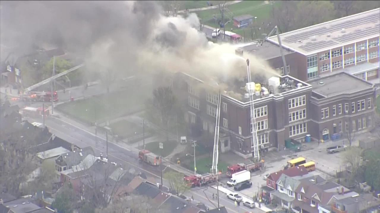 Crews battle 4-alarm roofing blaze at adult learning centre in Greektown