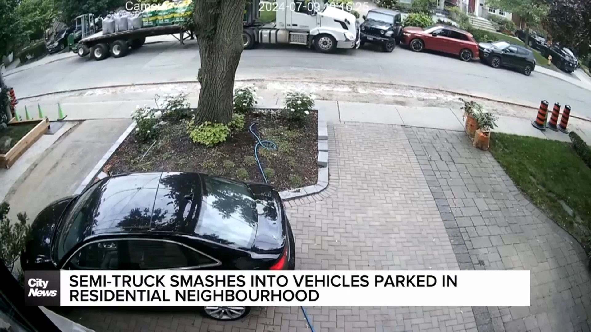 Semi-truck smashes into parked cars on residential neighbourhood