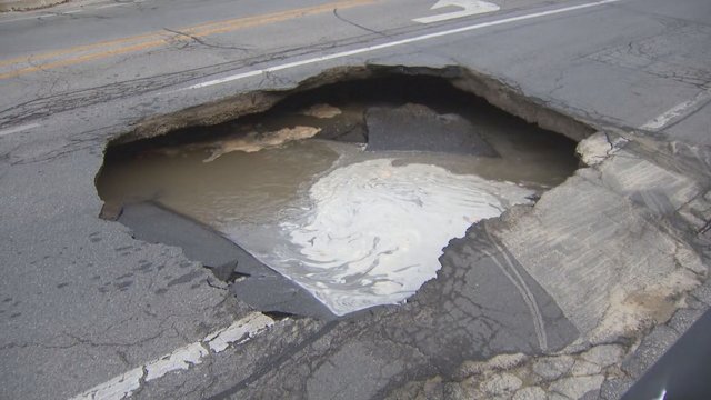 Sinkhole swallows portion of street in Toronto's east end