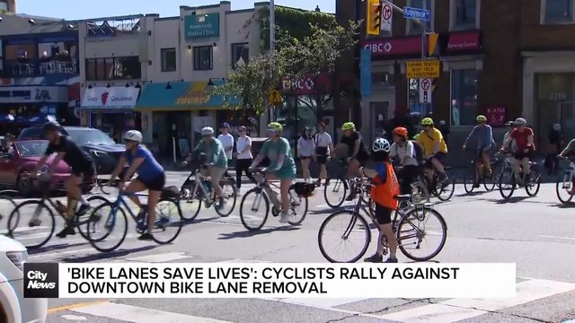 Cyclists rally against downtown bike lane removal