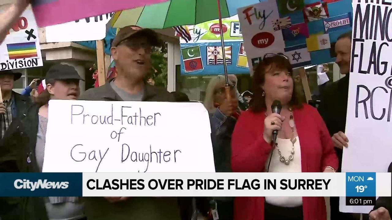 War of words amid protests over raising of pride flag at Surrey