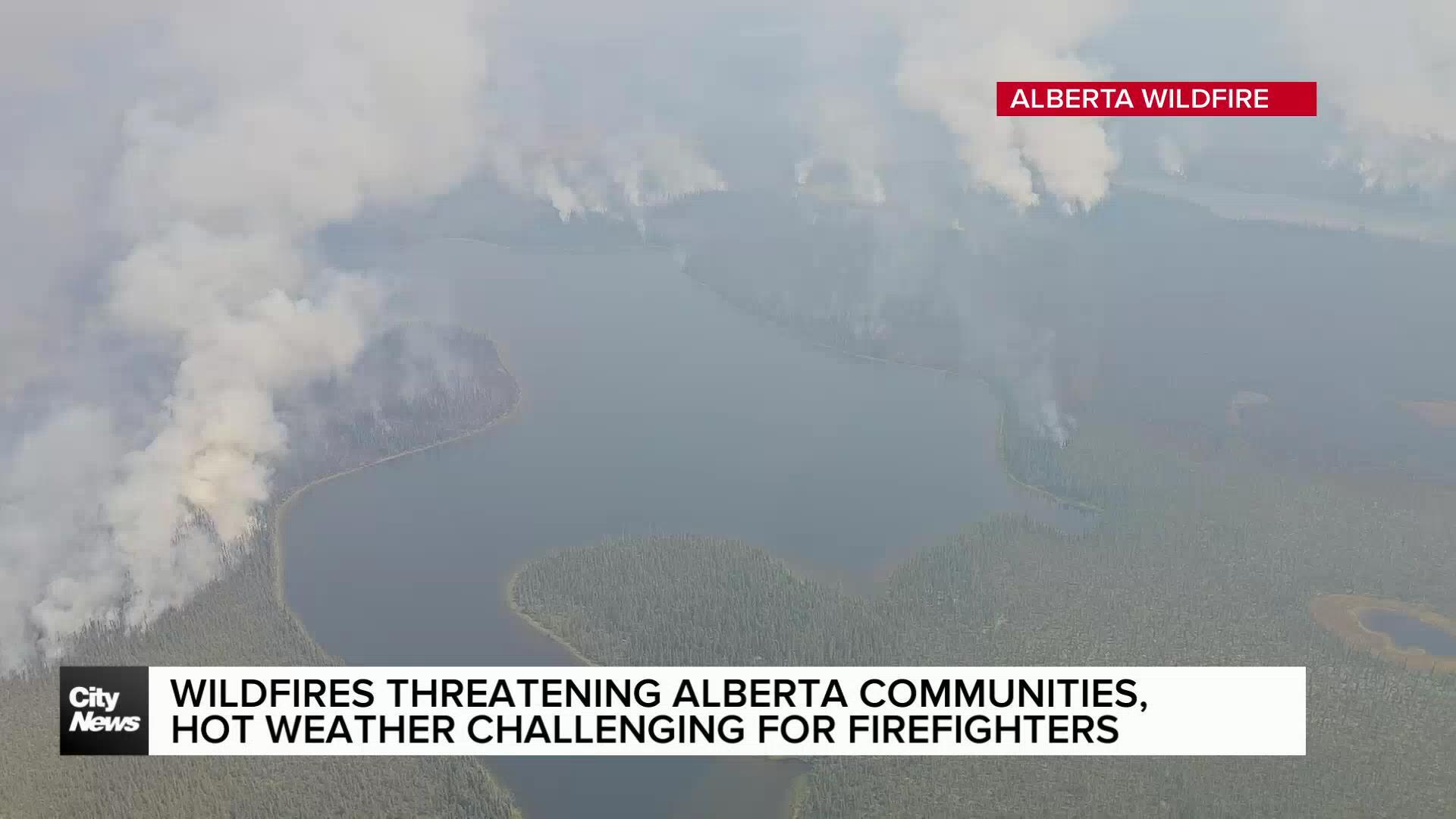 Wildfires threatening Alberta communities, heat wave challenge for firefighters