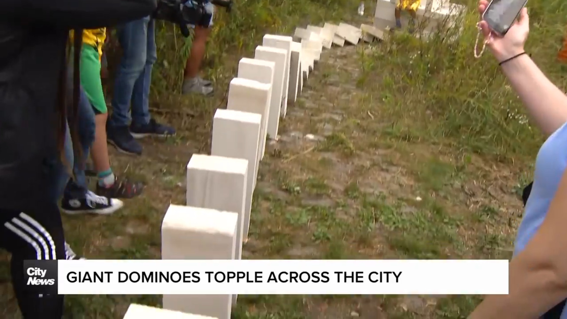 8,000 giant dominos knocked down in Toronto