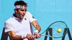Hot Shot: Etcheverry goes back and forth before clinching stylish break in Madrid