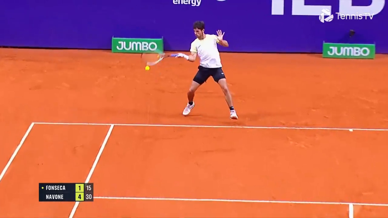 Hot Shot: Home favourite Navone putting on a show against Fonseca in Buenos Aires