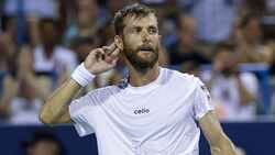 Hot Shot: Moutet the entertainer sends de Minaur's smash back in style in Washington