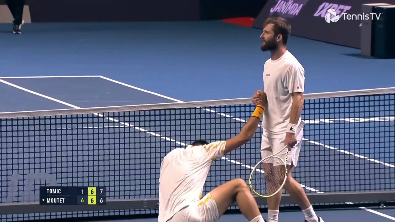 Tomic collapses to court after winning incredible point-of-the-year contender in Almaty