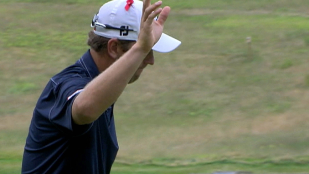 Bryce Molder hammers in his eagle putt on No. 15 at Travelers