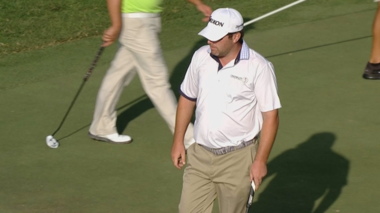 Jim Renner finds the cup for eagle on No.18 at Sony Open