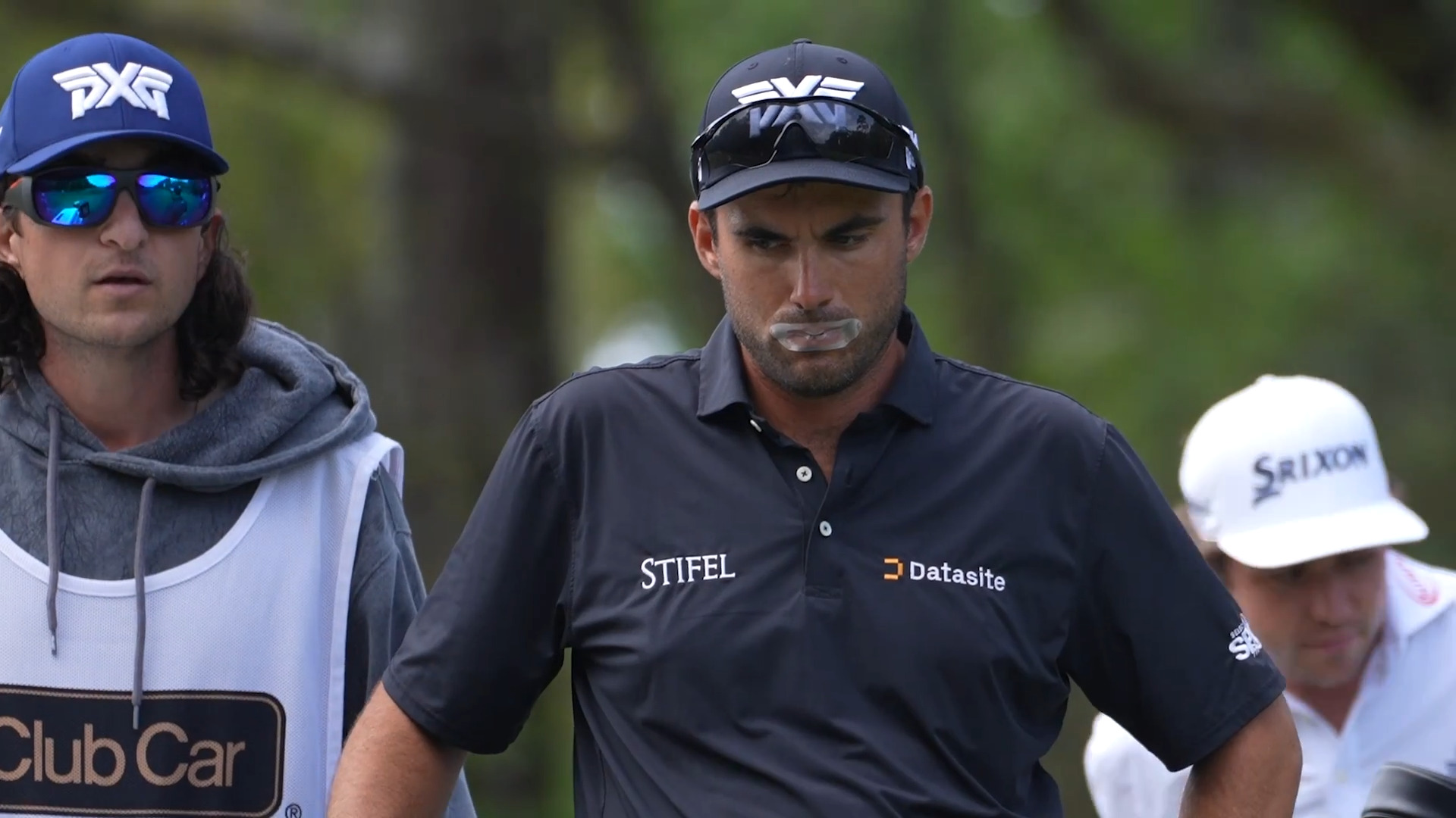 Ryan McCormick tapes his mouth shut during Club Car Championship