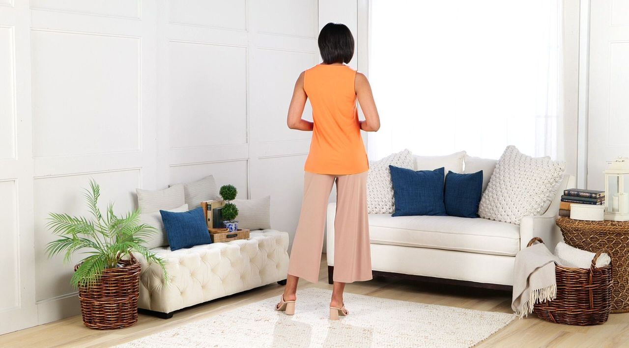 Susan Graver Liquid Knit Sleeveless A-Line Top w/ Grommet Detail