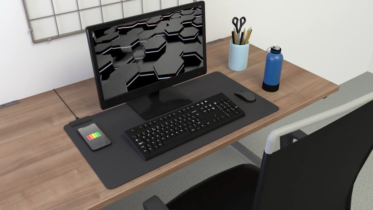 This wireless charging desk mat keeps your EDC gadgets charged