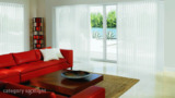 Want to preserve the view of a large, picturesque window? Vertical blinds are the traditional choice for covering sliding glass doors for patios and porches. Learn more about the benefits and features to find out if they're right for you.