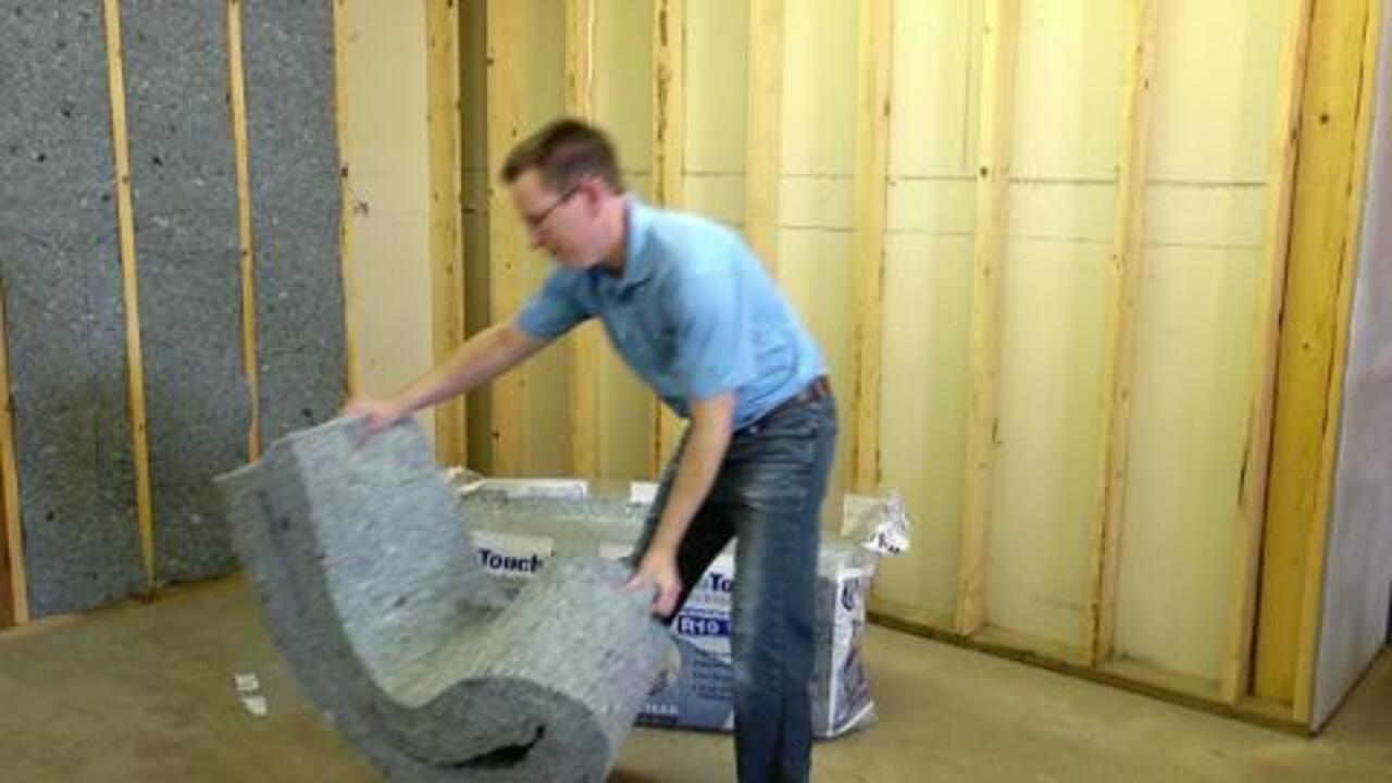 Installing denim insulation - Groundwork USA