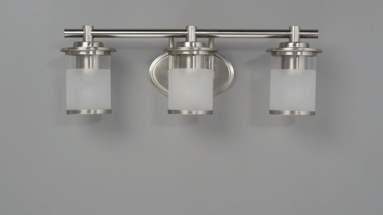 Hampton Bay Truitt 3 Light Brushed Nickel Vanity Light With Clear And Sand Glass Shades Hb2577 35 The Home Depot