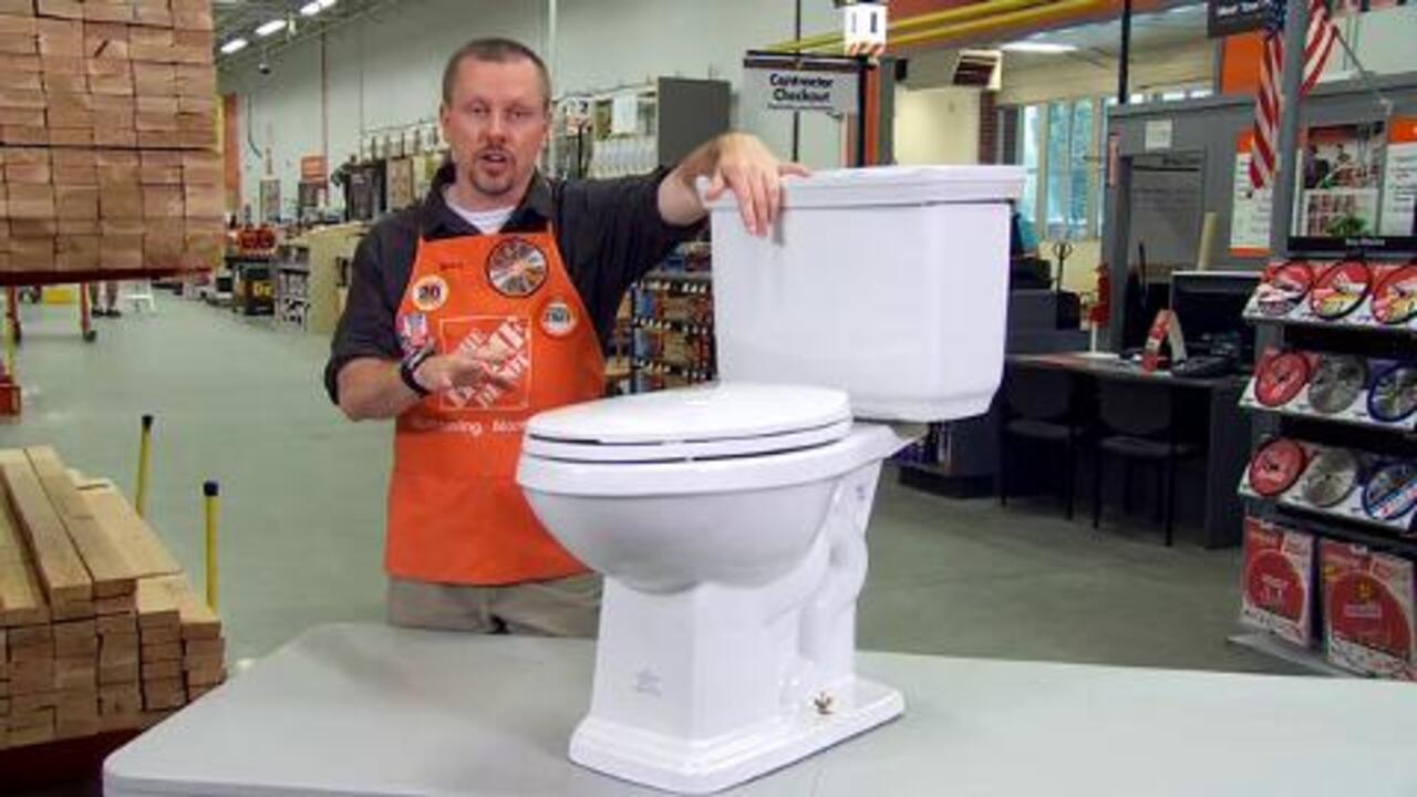 Glacier Bay - 2-piece 1.0 GPF/1.28 GPF High Efficiency Dual Flush Elongated Toilet in White, Seat Included