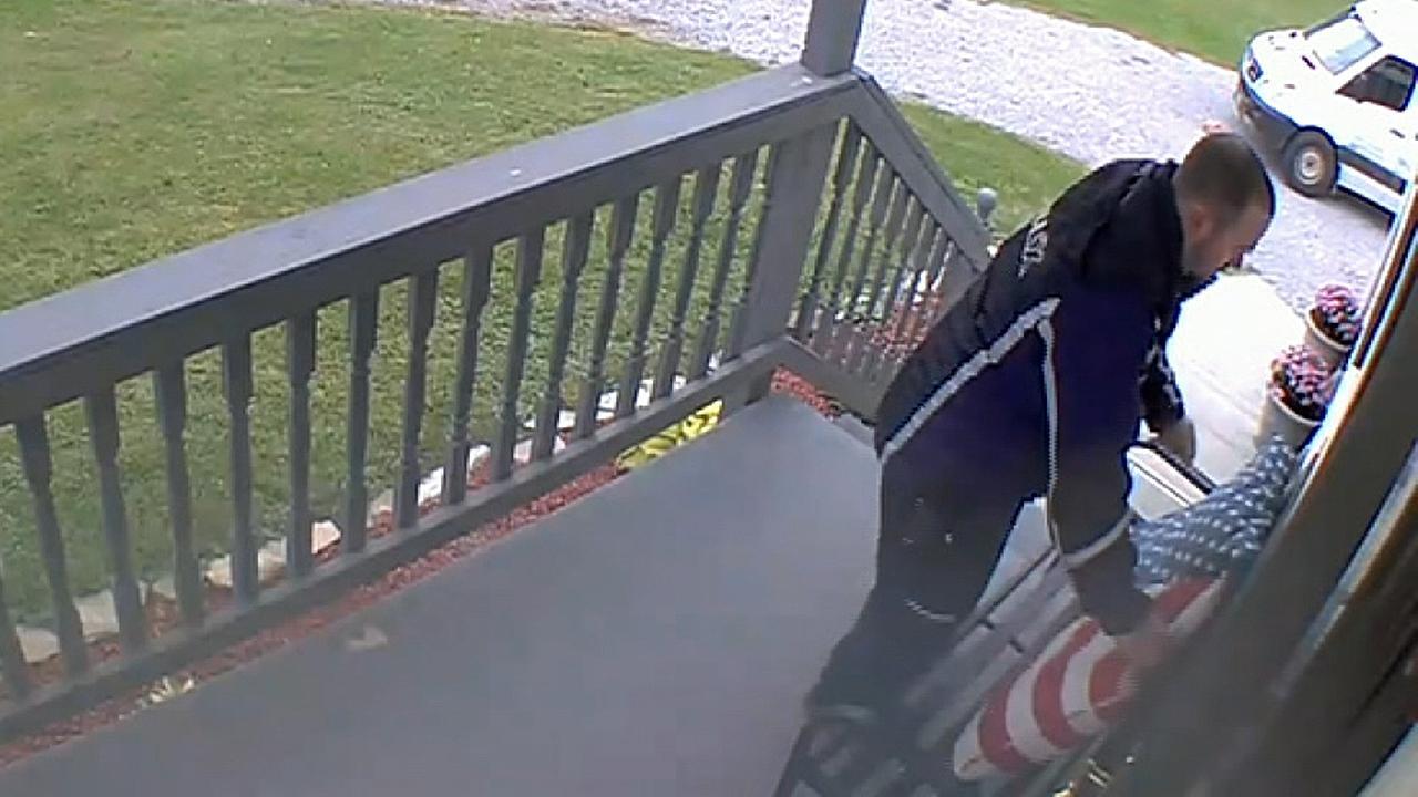 Ohio FedEx delivery man flips a set of stars and stripes pillows