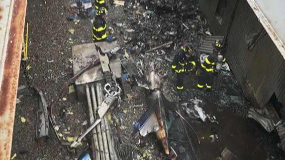 Helicopter crash lands on roof of NYC high rise