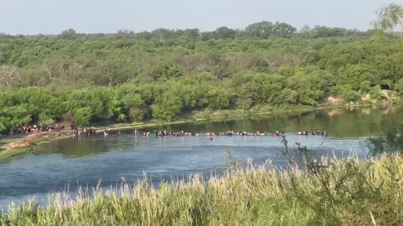 Fox News footage shows migrants walking across the Texas border