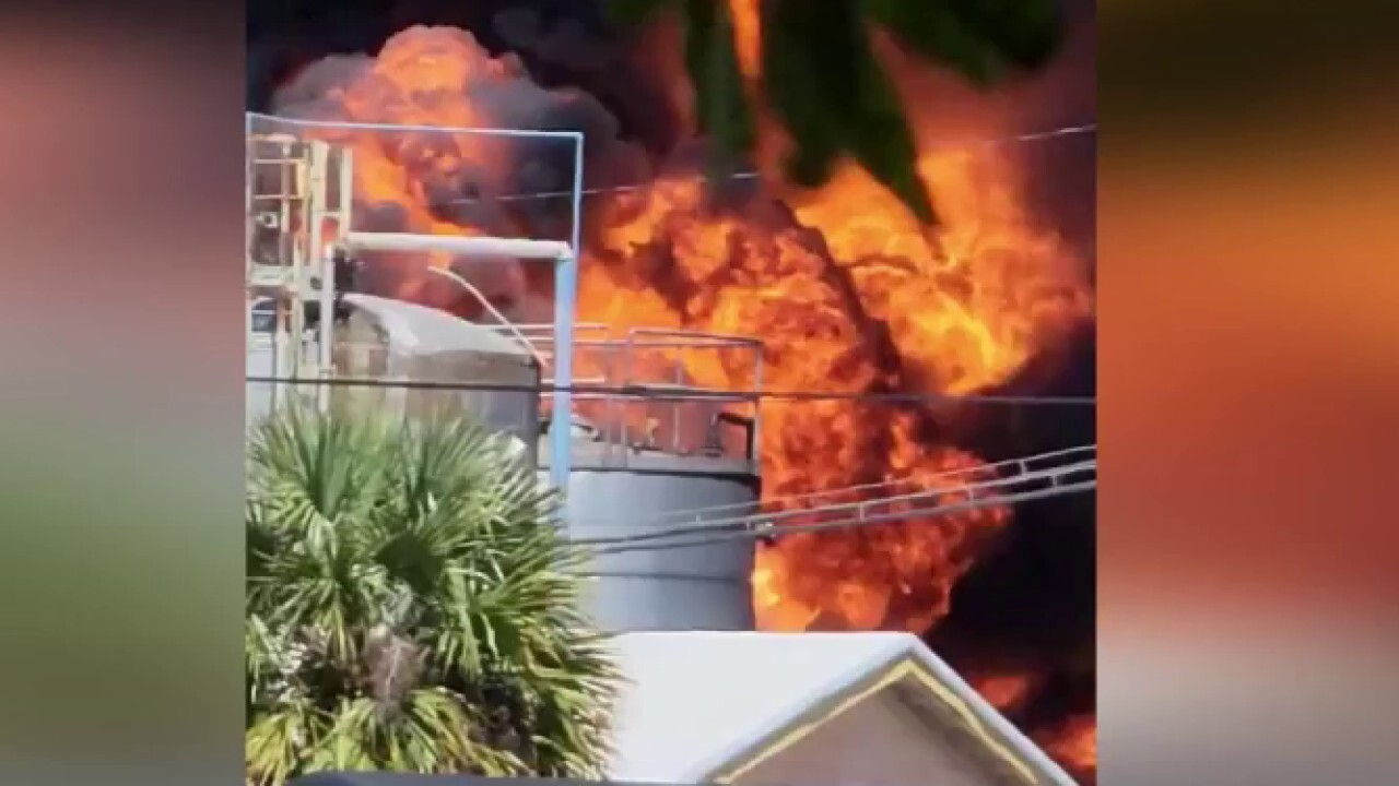 Fire at Georgia plastics plant erupts in phone video