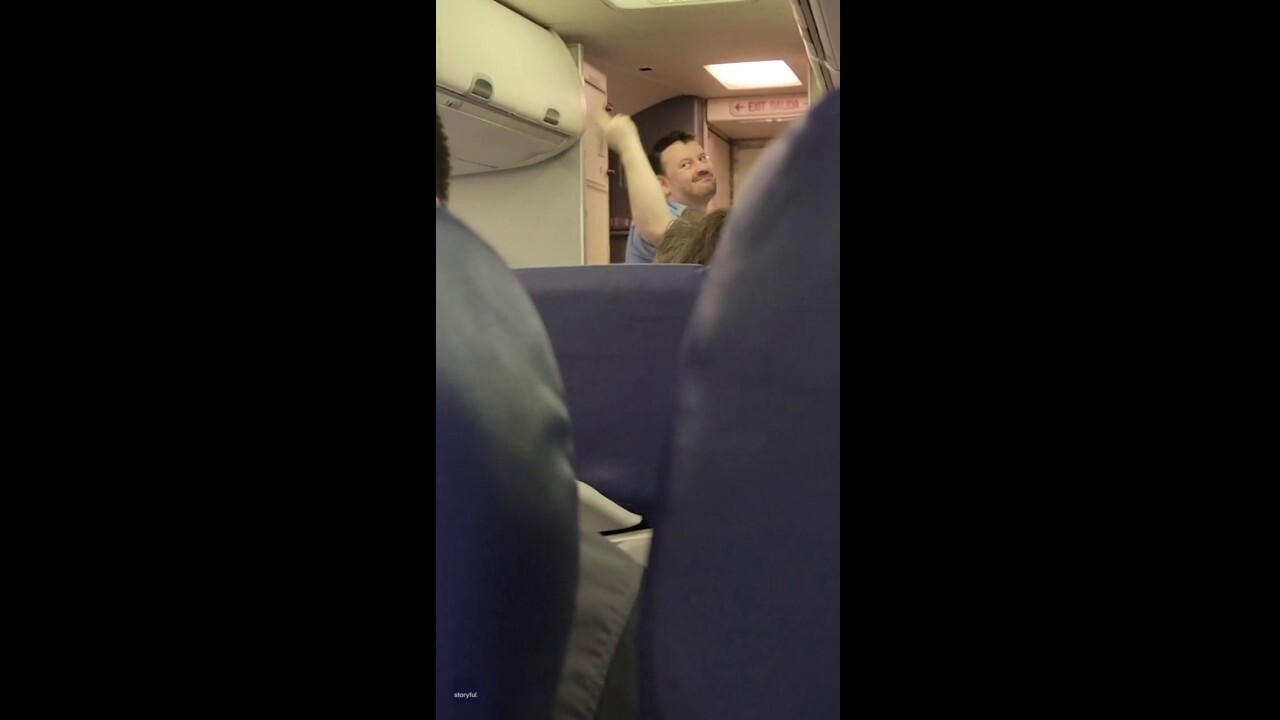 Airline flight attendant takes safety instructions to dramatic level