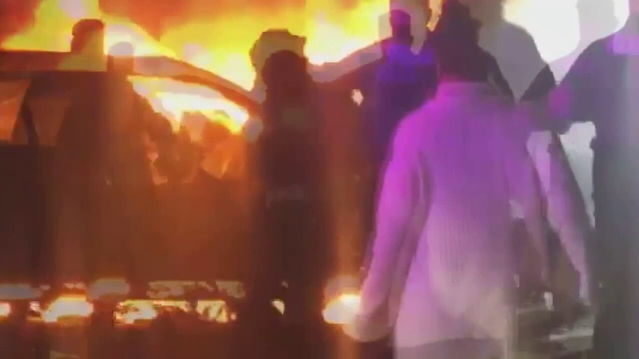 San Francisco man survives after being pulled from flaming car 