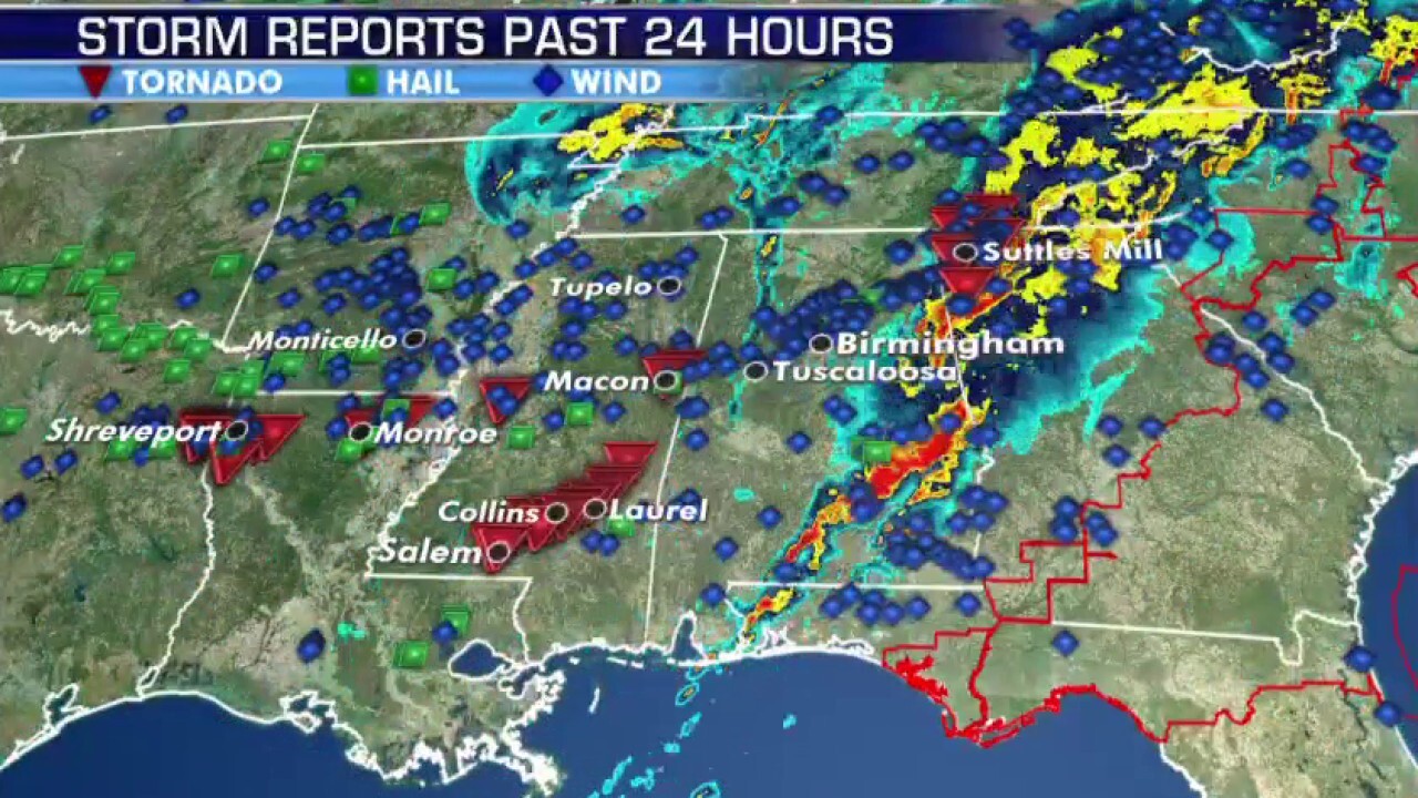 At least a dozen killed as tornadoes rip through the South