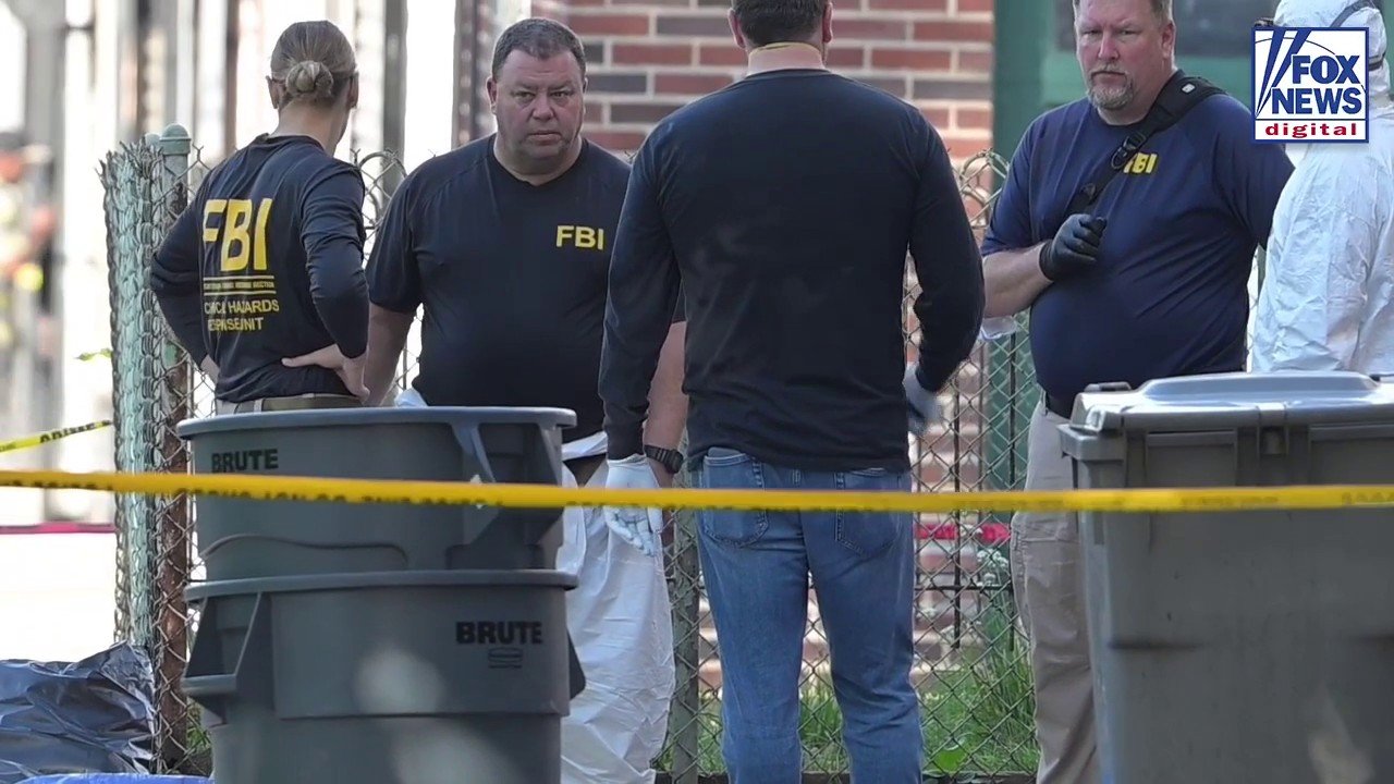 FBI agents continue their investigation at the home of Eugene Horsch