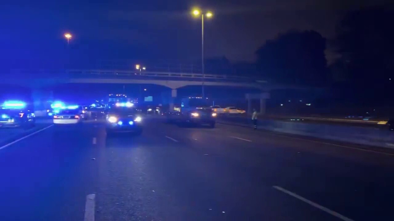 Four men in Alabama wounded during shootout on interstate over allegedly stolen car