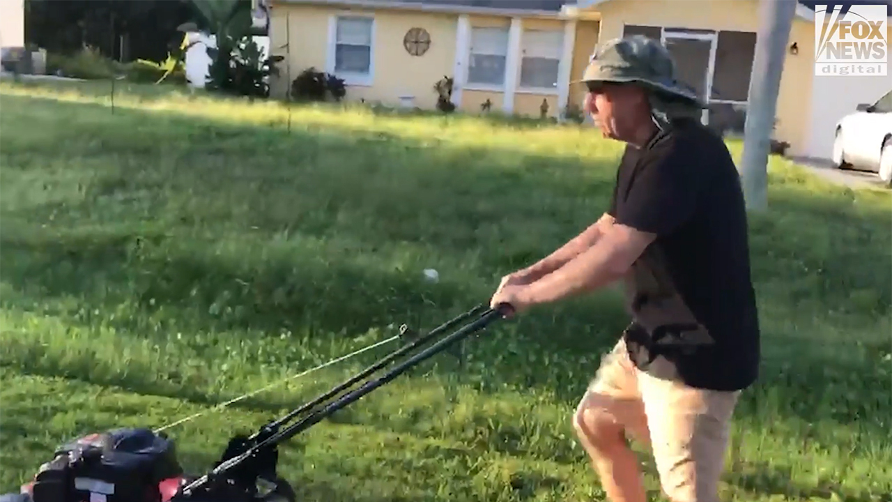 Chris Laundrie mowing the lawn less than 24 hours after coroner determined their son's fiancée was killed by strangulation