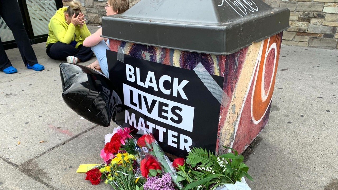 Minneapolis mayor says officers involved in restraint death of black man have been fired	