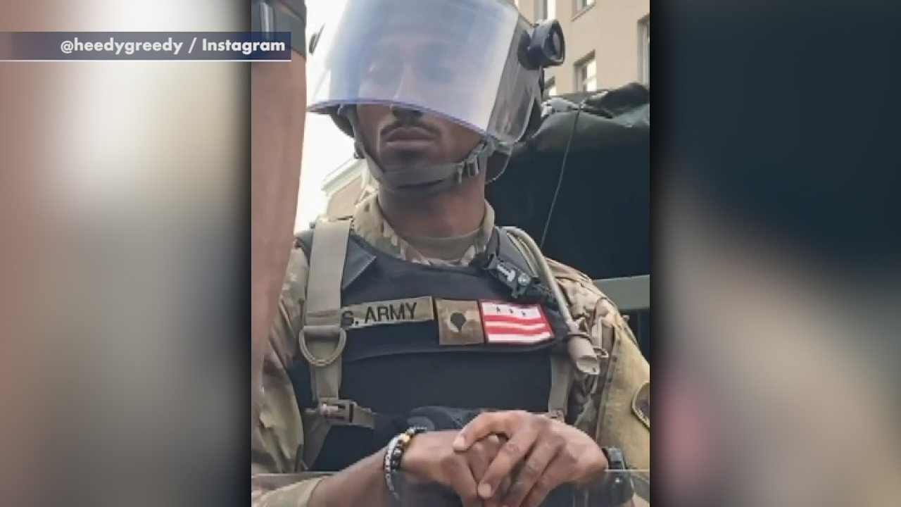 National Guardsman appears to join in protesters' 'I'm black and I'm proud' chant in DC