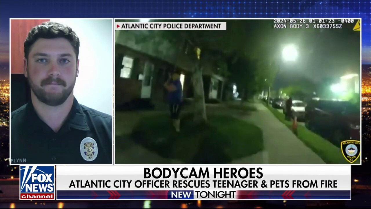 'It's my job': Police officer saves teen, pets from fire
