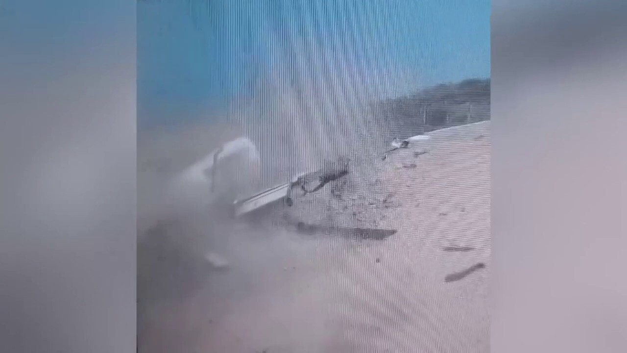 Plane skids off runway and crashes at Somalia airport