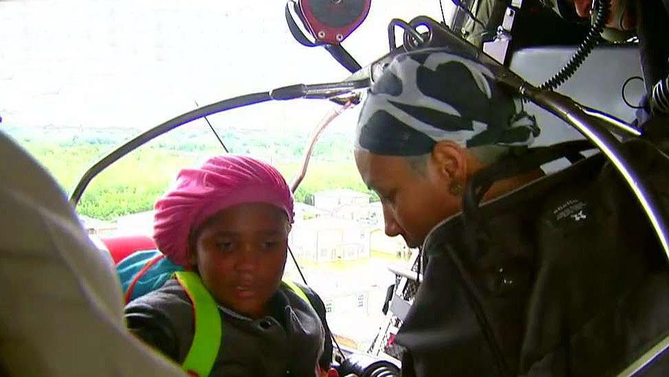 Helicopter crew plucks Beaumont family to safety