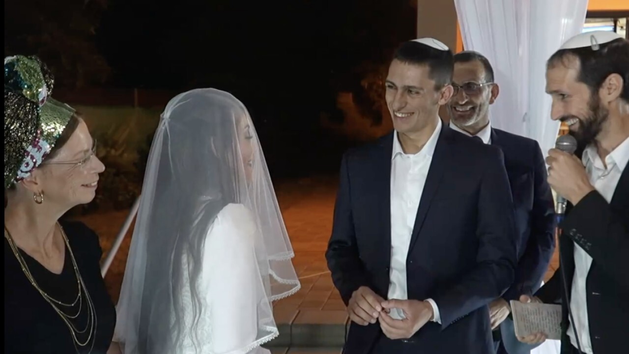 Israeli soldier celebrates wedding days after he's shot, his brother goes missing in action