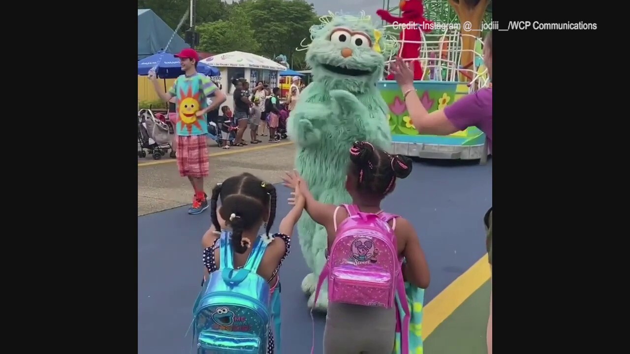 Sesame Street character ignores two children at park