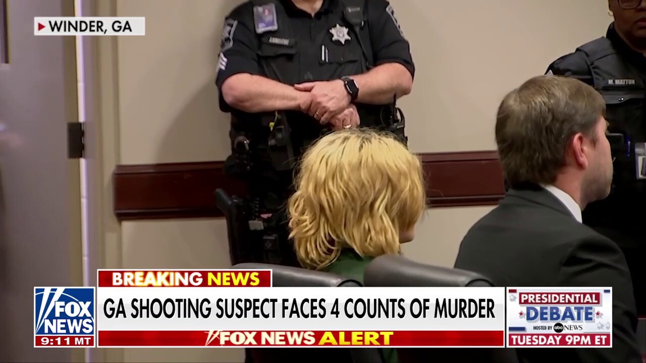 Georgia shooting suspect and father appear in court