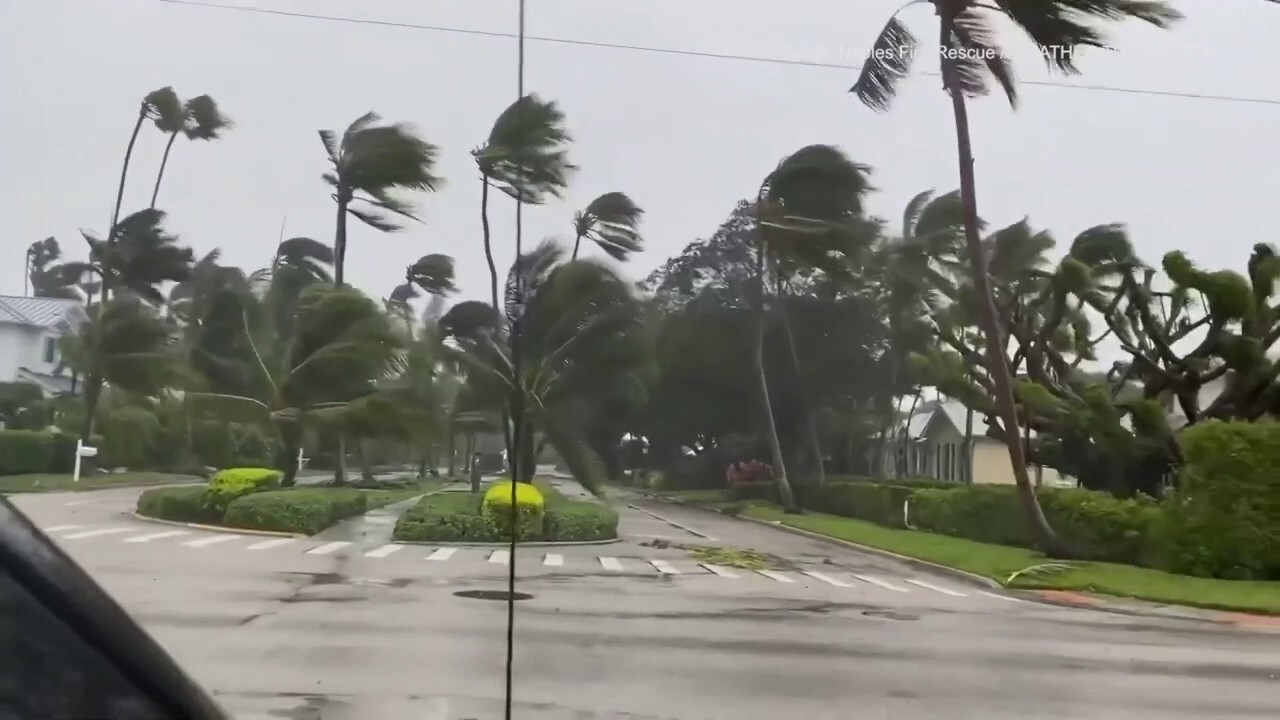 Ian storm surge sweeps into Naples, Florida