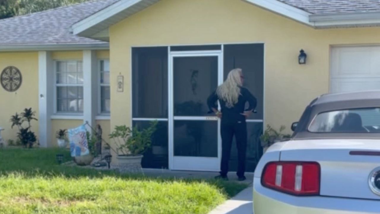 Watch moment Dog the Bounty Hunter knocks on front door of Laundrie Florida home