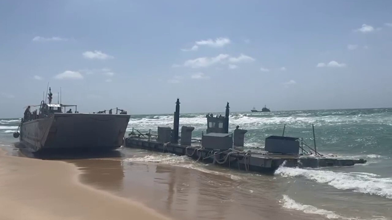 Fox News video shows a beached Navy vessel after botched retrieval of pier piece