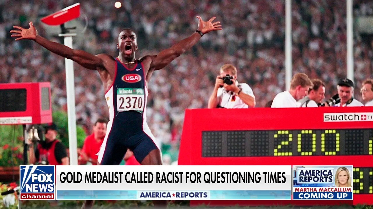 Michael Johnson called racist for questioning race times at world championships