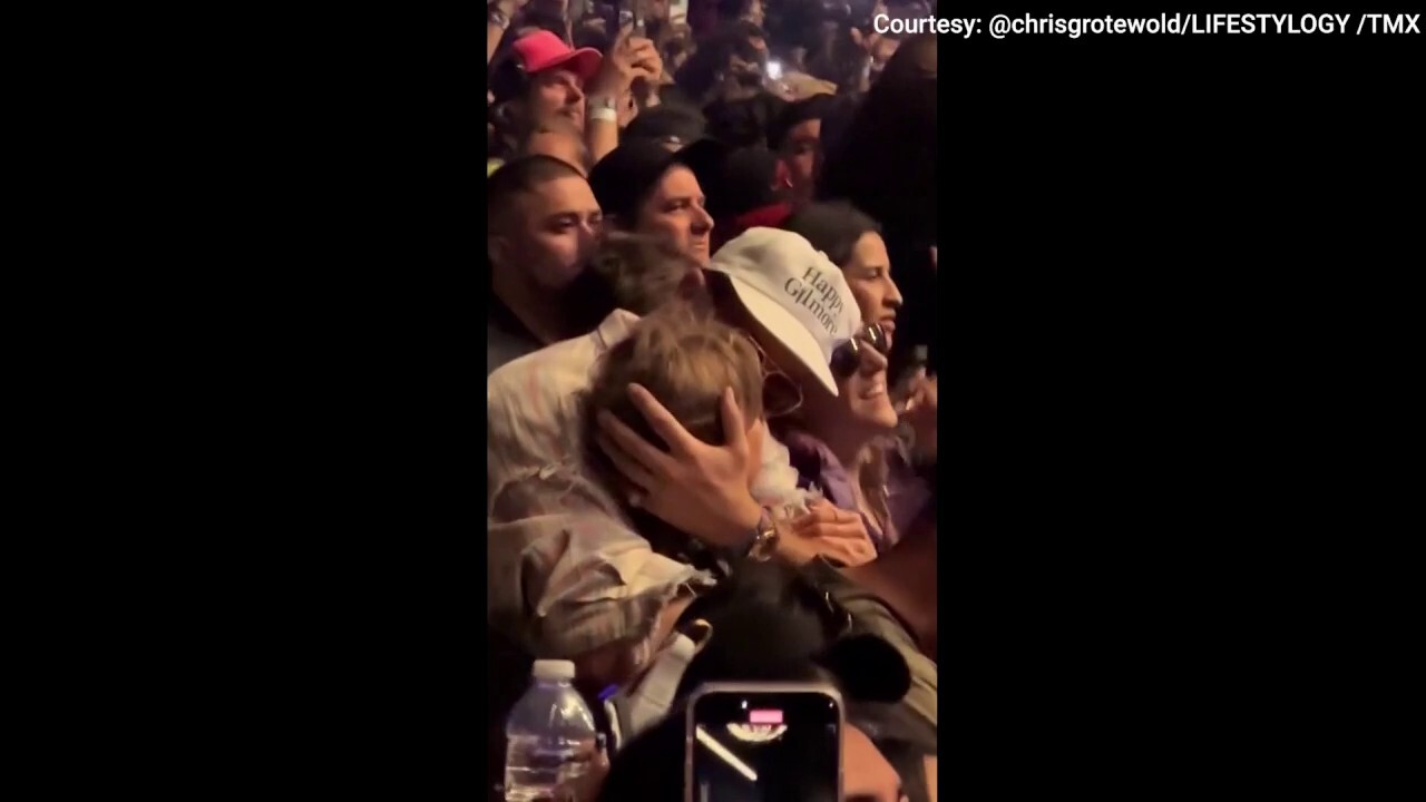 Taylor Swift and Travis Kelce embrace at Coachella 