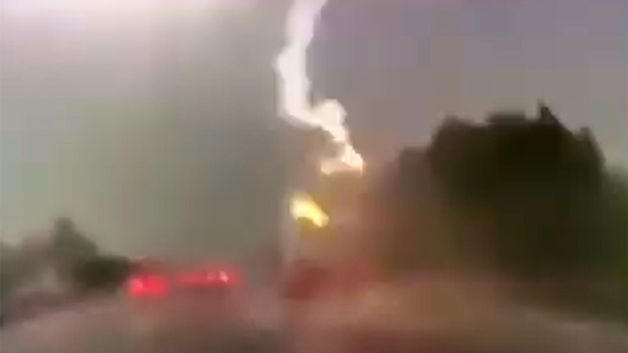 Lightning strikes truck on highway