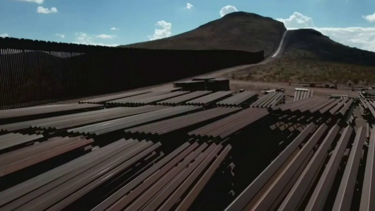 Piles of metal beams sit unused along the southern border