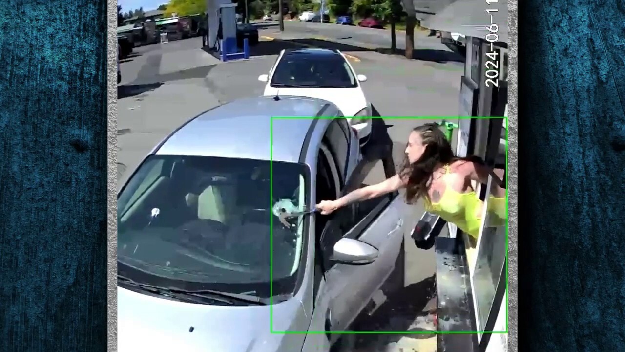 Bikini-clad barista smashes customer windshield after coffee thrown at her