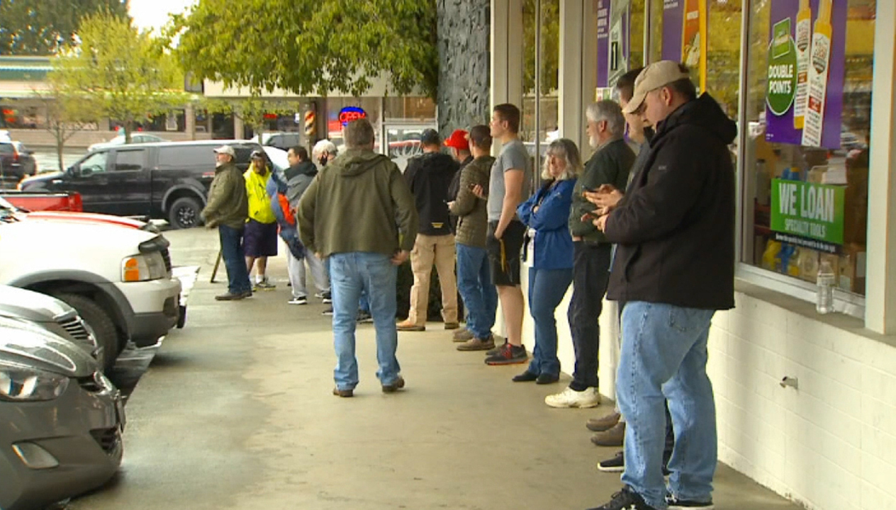 Long line forms outside barbershop in Washington operating outside 'stay-at-home' order